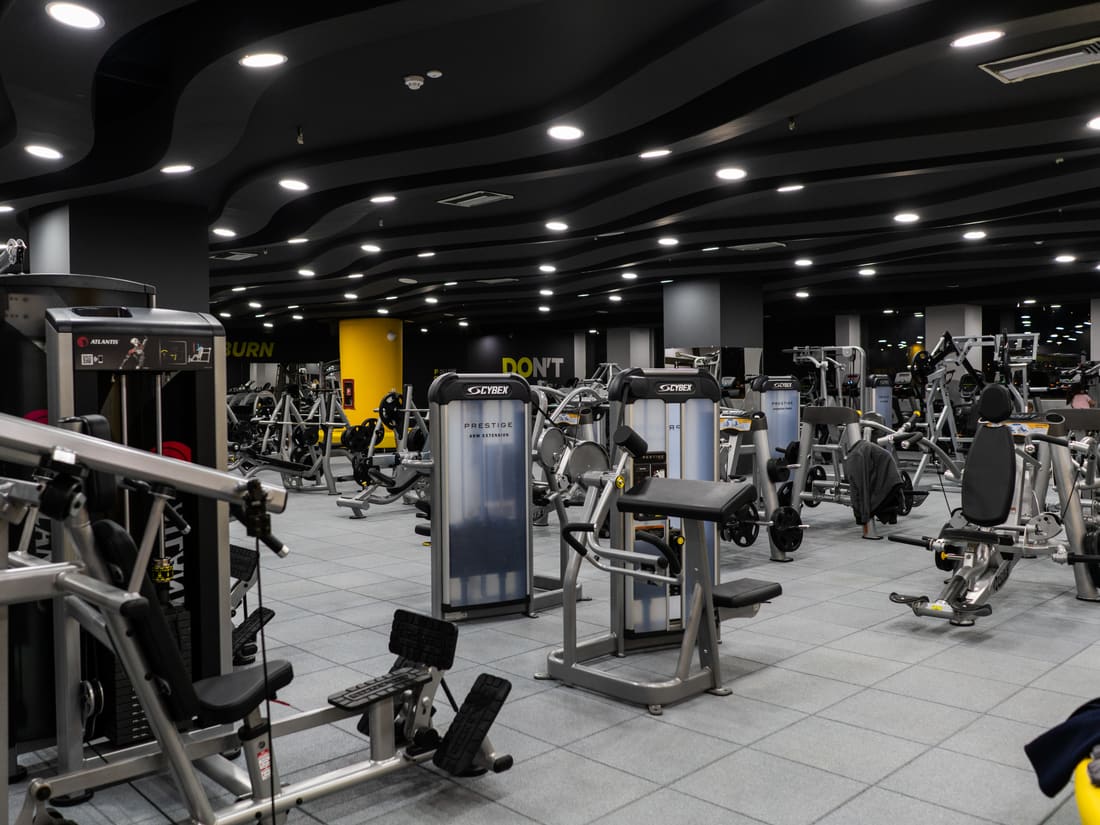 Weight machines on a rubber tile floor